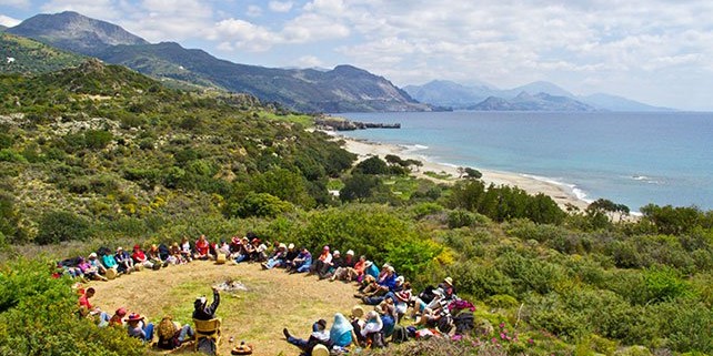 Shamanic pilgrimage to Crete with students sitting in a ceremonial circle.